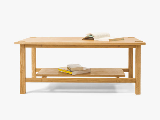 Minimalist handcrafted coffee table made from solid wood, Japandi-inspired design with custom details, perfect for modern living room interiors and contemporary elegance. Front view