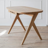 Kunsst wooden writing desk can successfully be used as  for makeup desk in bedroom or even wooden office desk, wooden desk with drawers with drawer under desk or solid oak desk for home office angled view.