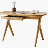 Designer solid wood desk for small spaces  with  magazine and two cups on oak desk top standing on white background