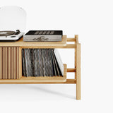 Oak cabinet for vinyl records collections with turntable and amplifier on top